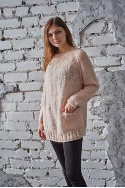 Hand knitted jumper.