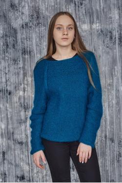 Hand knitted jumper.